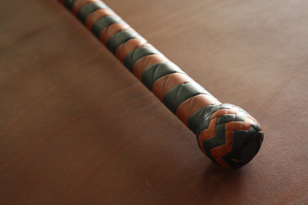 4 Strand Stockwhip with Two Tone Half Plait Handle.